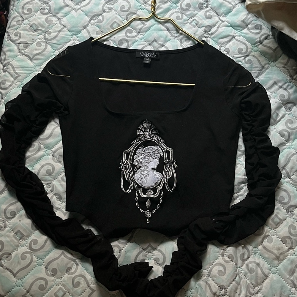 victorian style corset top with mesh sleeves